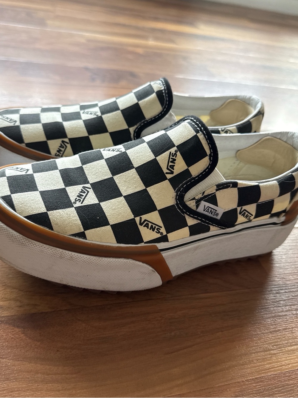 Vans Black and White Checkerboard Slip-On Sneakers